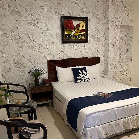 RedDoorz Trang An Hotel Ho Chi Minh-stad Buitenkant foto