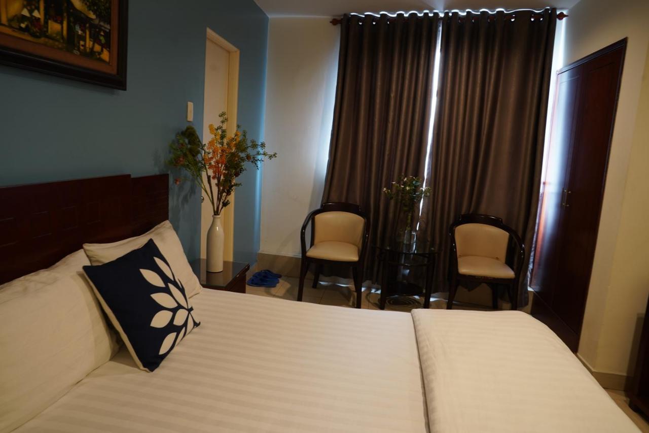 RedDoorz Trang An Hotel Ho Chi Minh-stad Buitenkant foto